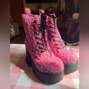 Delia’s pink black teddy lace up platform boots